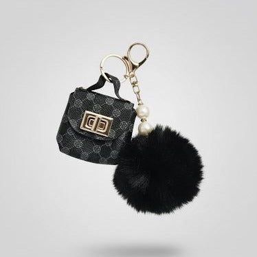 Pompon-Taschenanhänger – flauschig mit Mini-Tasche